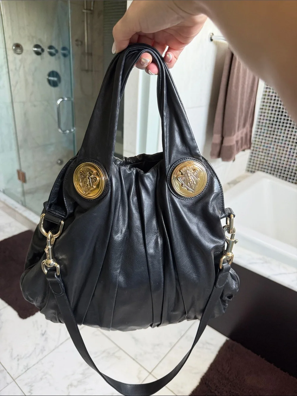 Gucci Black Leather Hobo Bag with Gold Medallions